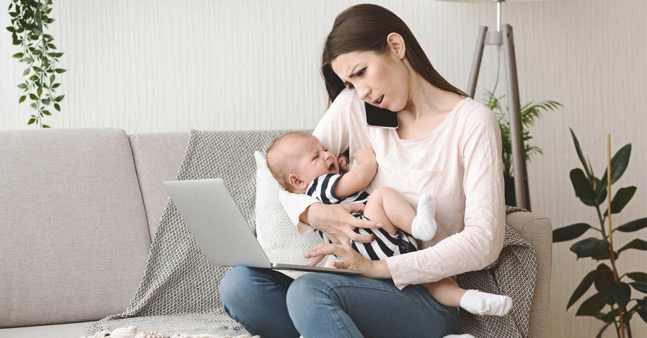 Worried mother holding her baby, representing infant injury and potential medical negligence claim